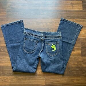 Flare jeans from Dear with an embroidered bird on the pocket.